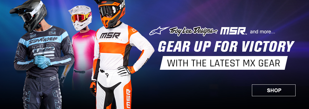 Gear up for victory with the latest mx gear, three guys wearing the latest gear from Troy Lee Designs, Alpinestars, and Thor, dramatic blue lighting in the background